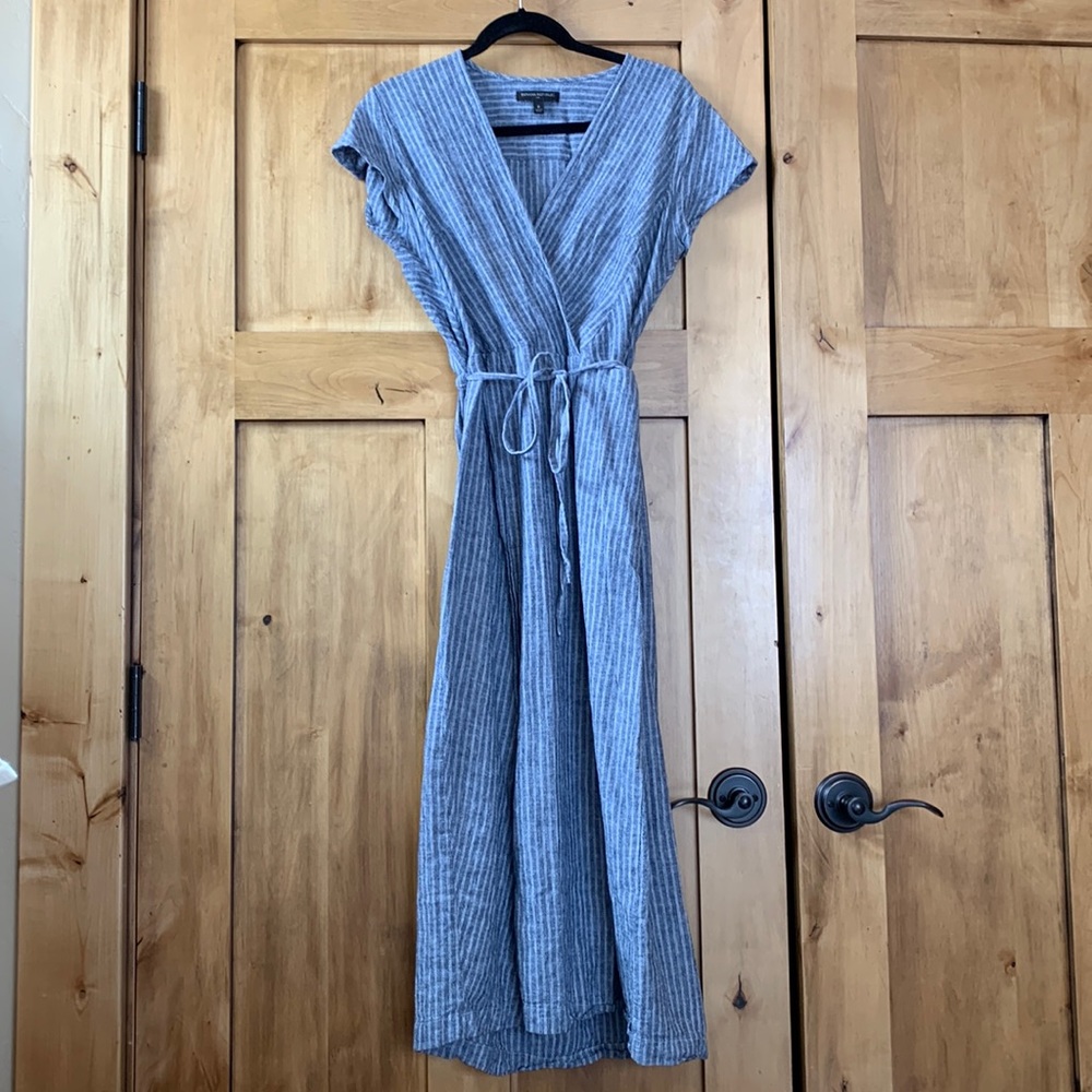 Blue and white striped faux wrap dress